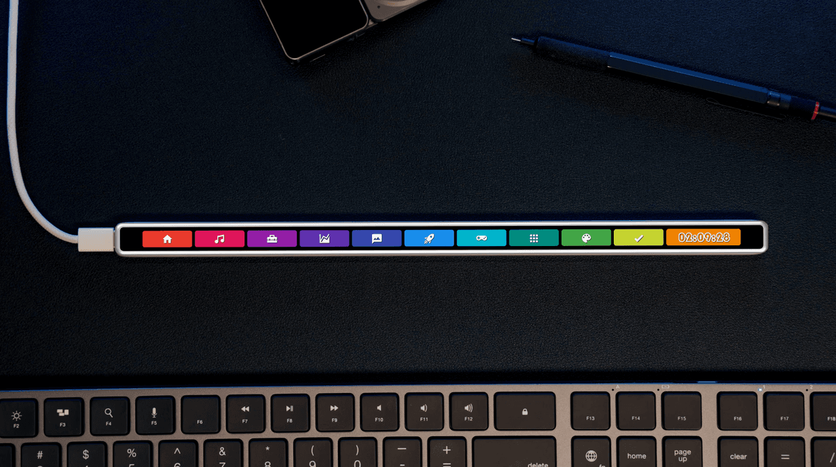 A standalone touch bar above a keyboard.